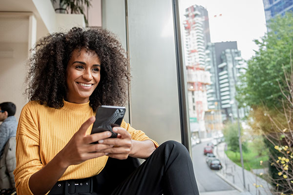 Girl with phone in hand